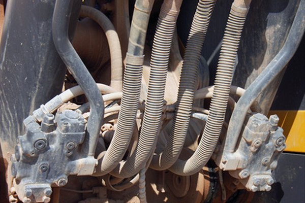 Hydraulic pipes from an industrial vehicle image by JCVStock from Fotolia.com ...