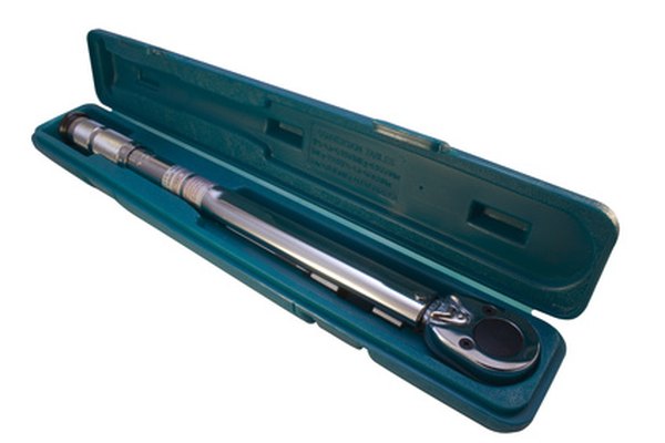 torque wrench in box image by Christopher Dodge from Fotolia.com ...