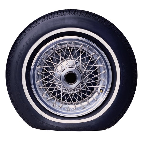 Photodisc/Photodisc/Getty Images Flat Tire